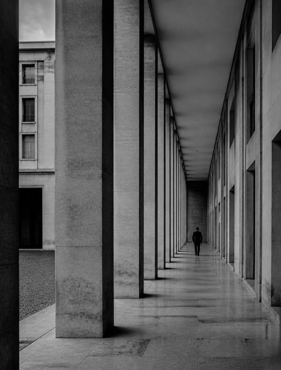 Milanese rationalist courtyard, black and white.